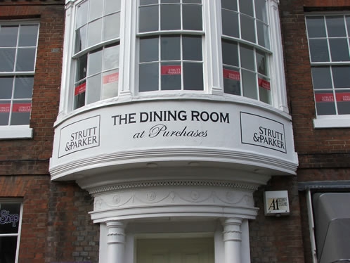 Hand painted sign at Purchases of Chichester