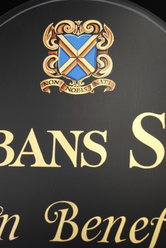 Hand painted Heraldic Crest signwritten on a Schools honours board for St Albans School