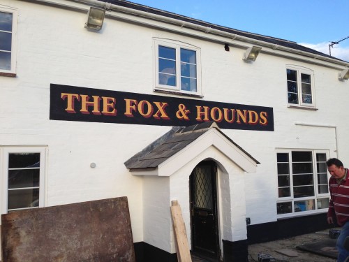 Pub sign for the Fox and Hounds, Denmead, Hants