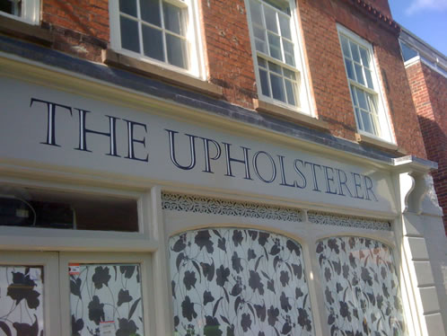 Painted shop front sign