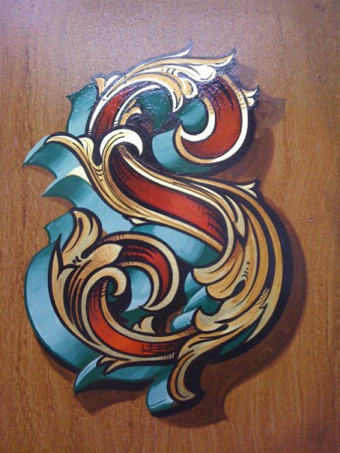Fancy letter S in Gold leaf and painted decoration