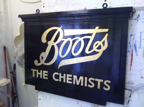 New hanging sign for Boots chemists Midhurst W. Sussex