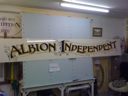 Hand painted sign written shop front sign for Albion Tattoo Studio, with a vintage design,