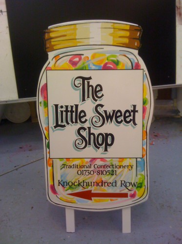 Handmade sweet shop pavement sign