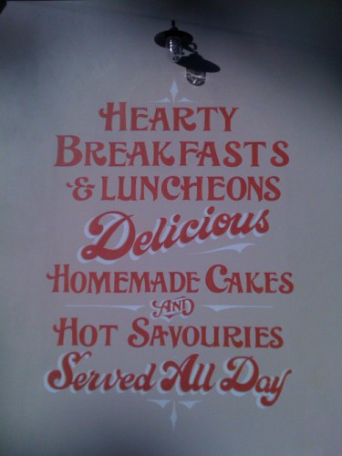 Signwriting directly to rendered wall