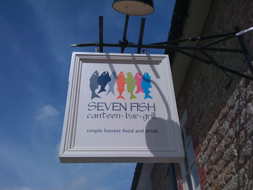 Hand lettered and painted sign at Seven Fish restaurant Midhurst