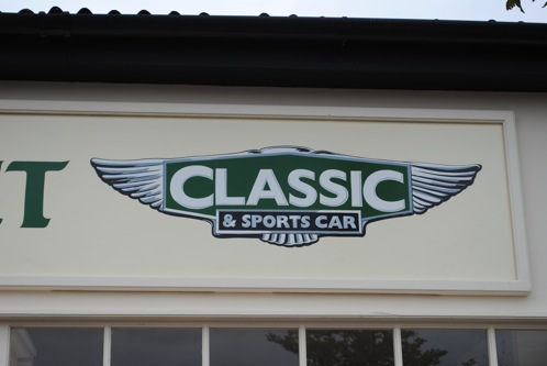 Classic and Sports car magazine hand painted shop sign