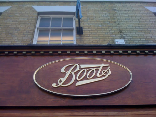 23.5 carat gold leaf gilded Boots sign