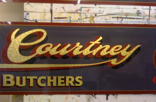 Traditional Gold leaf lettering with shadow and shade, Used for a family Butchers shop.