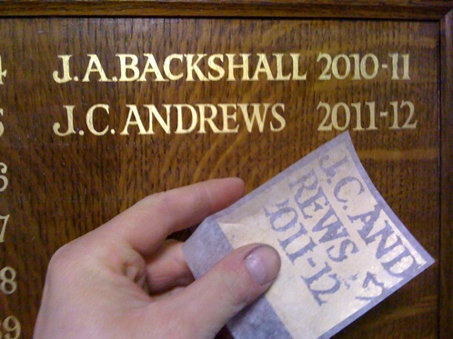 Gold leaf lettering on school honours boards