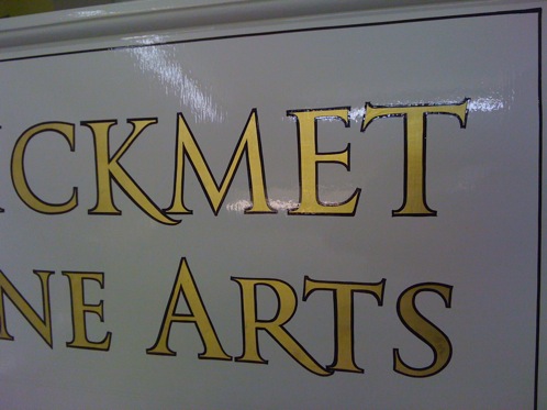 Hand painted Gold leaf lettering with a dark outline