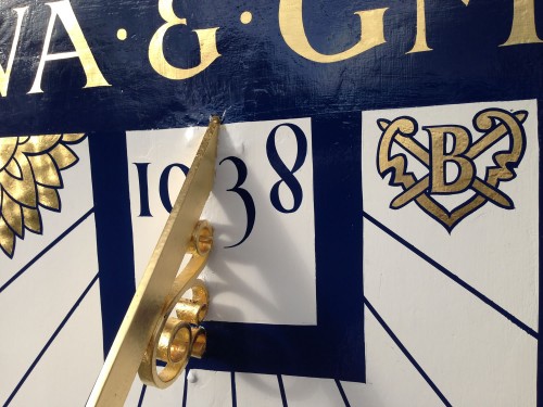 Hand painted sundial in sussex - detail showing the new gold leaf and paint