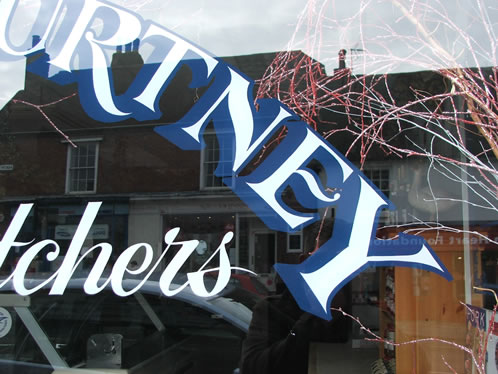 Reverse painted Lettering on glass butchers shop window