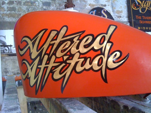 Custom Gold leaf hand painted signwriting on a motor cycle tank