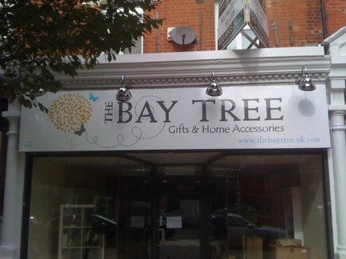 A contemporary hand painted shop front sign for this Chelmsford gift shop