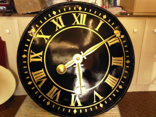 Restored church Gold leaf clock face