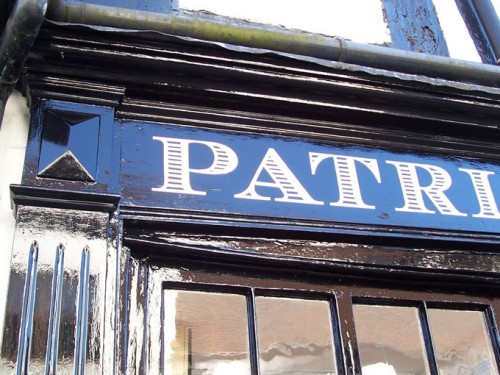 Victorian shop front, signwritten in gold leaf