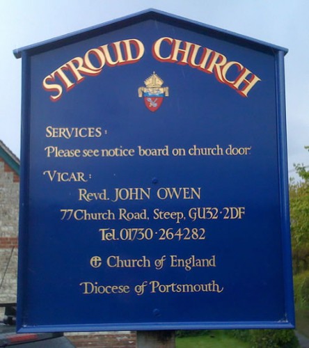 Church notice board with heraldic badge and gold lettering | Osborne Signs