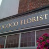 Gold leaf signboard with dark shade at Rococco Florists Chichester