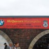 Vintage style distressed signboard at garage display, Goodwood Revival, Chichester West Sussex