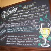 Hand written pub chalkboard