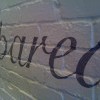 Hand painted lettering to rough brick surfaces