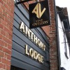 Hand signwritten sign and gilded lettering