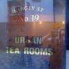 23 carat Gold leaf gilding on a glass door at Urban Tea Rooms, London, give a vintage feel