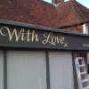 Contemporary style signwritten shop front